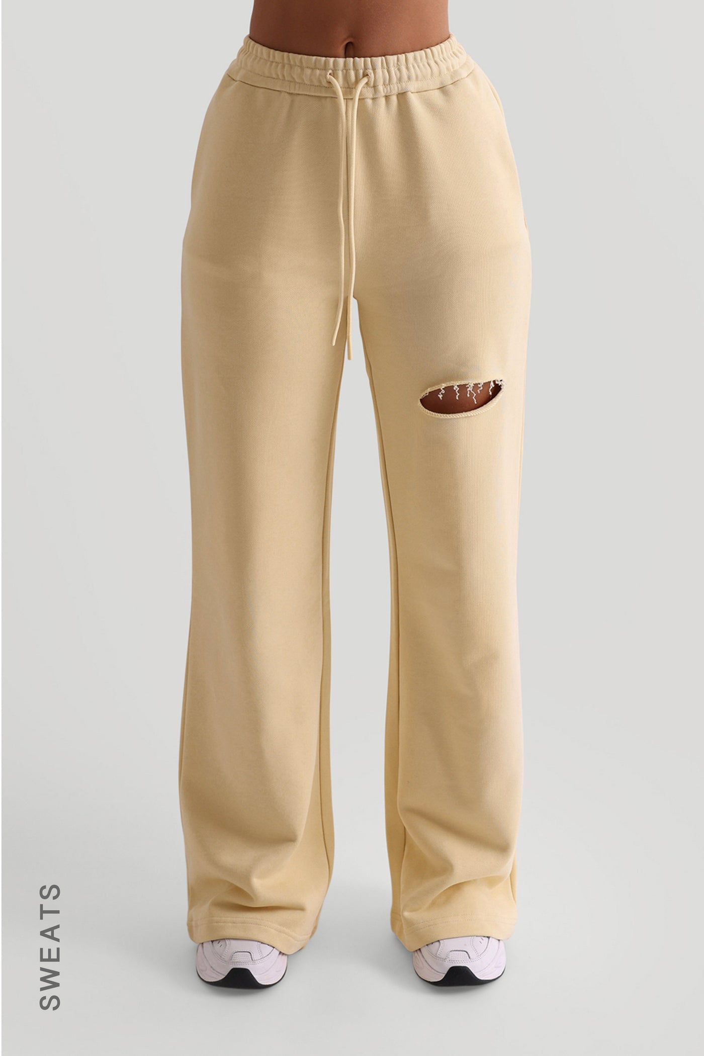 Jogginghose mit weitem Bein und Cut-Out - Zartes Gelb
